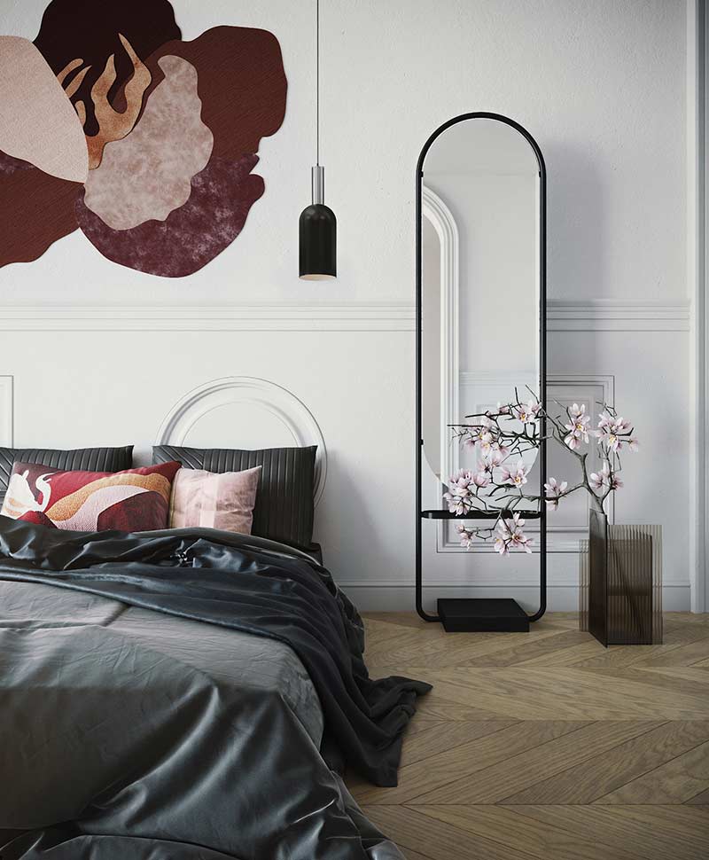 Ein AYTM Spiegel und eine Deckenlampe in einem Schlafzimmer